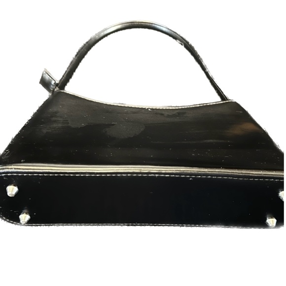 not known Handbags - Black handbag. Silver coloured details on zip, feet on bottom and side detail